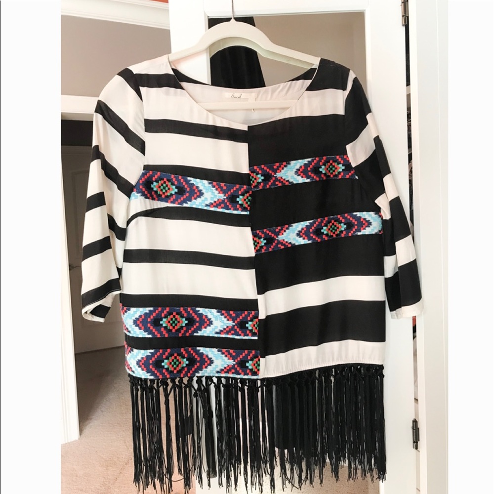 Top with silky black fringe + asymmetrical stripes